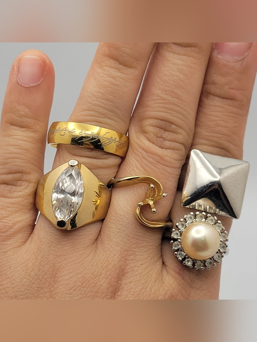 Gold-Tone Womenโs Fashion Ring with Clear Marquise Stone